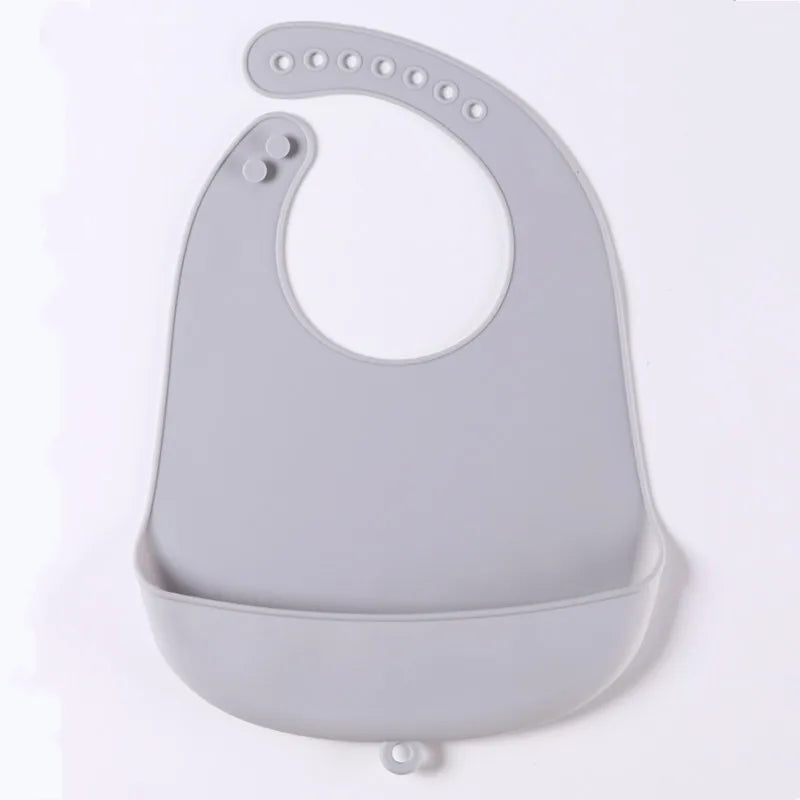 Grey food grade silicone baby bib, flexible and comfortable for infant feeding