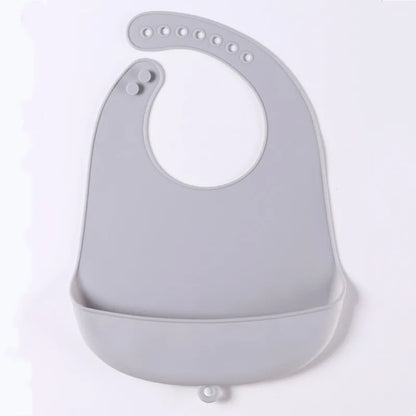 Grey food grade silicone baby bib, flexible and comfortable for infant feeding
