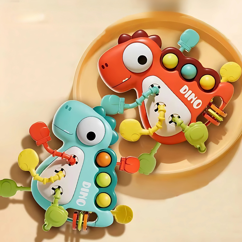 Baby sensory activity toy with silicone teether and colorful strings for fine motor skill development, red and blue.