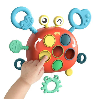 Baby Sensory Crab Montessori Activity Toy with pull strings for motor skills development and teething.