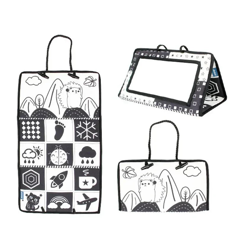 Baby gift: high contrast sensory mirror for tummy time, aids in visual & tactile exploration.