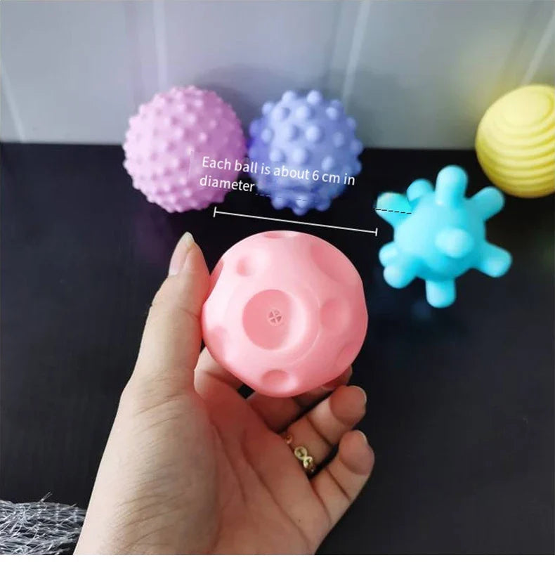 Soft grip ball, a developmental bath toy for babies, stimulating senses