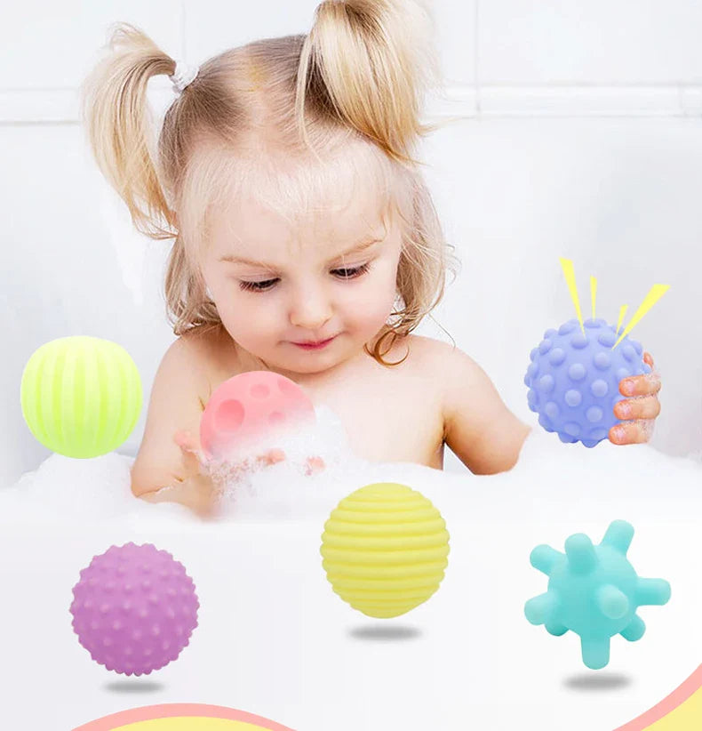 Textured rubber infant toy, a grip ball promoting sensory development in babies