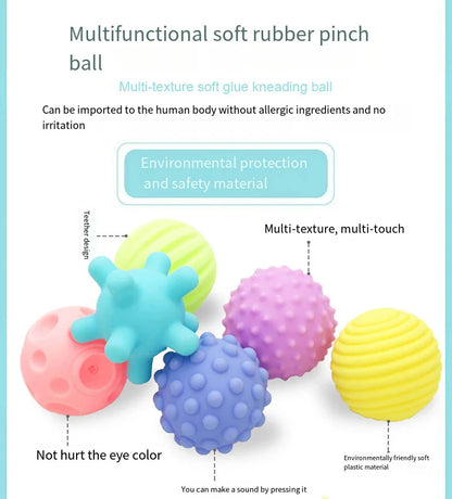 Close-up of a baby's hand grasping a soft rubber bath toy, sensory grip ball