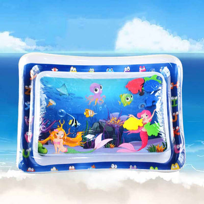 Baby on a sensory water mat, looking at a colorful fish floating inside, enhancing visual tracking