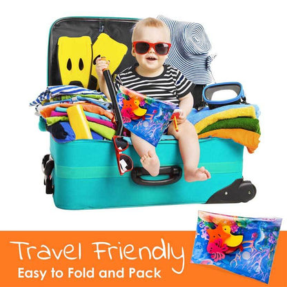 Smiling baby laying on a soft, inflatable water play mat during tummy time for sensory development