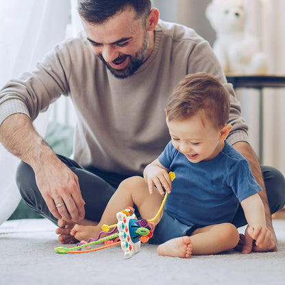 UFO-shaped textured teether toy for babies, promoting fine motor skills & sensory play