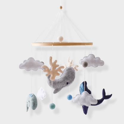 Baby Sensory Wooden Mobile with felt clouds, natural wood, and gentle hanging elements, perfect nursery decor