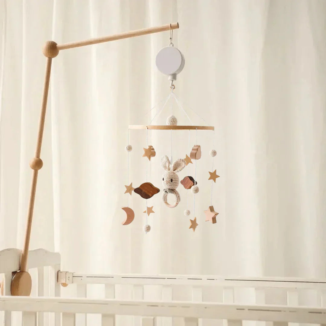 Full shot of a Baby Sensory Wooden Mobile, highlighting its balanced design and attractive natural materials