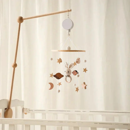 Full shot of a Baby Sensory Wooden Mobile, highlighting its balanced design and attractive natural materials