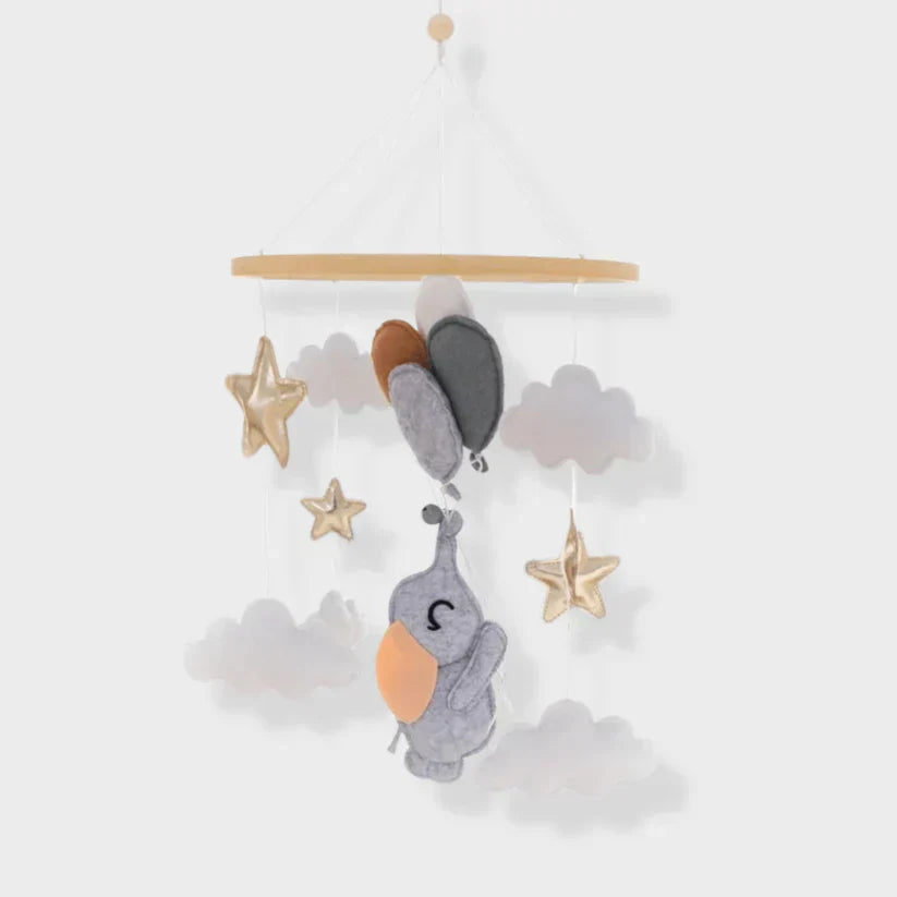 Baby Sensory Wooden Mobile with whimsical felt stars and moons hanging from a solid wooden frame, crib mobile