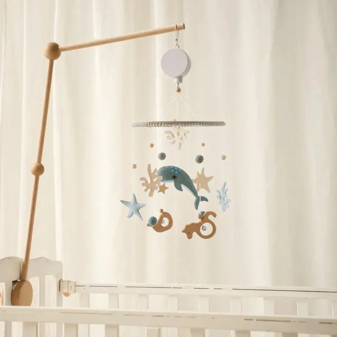 The Baby Sensory Wooden Mobile suspended, providing visual interest and promoting early development, sensory play