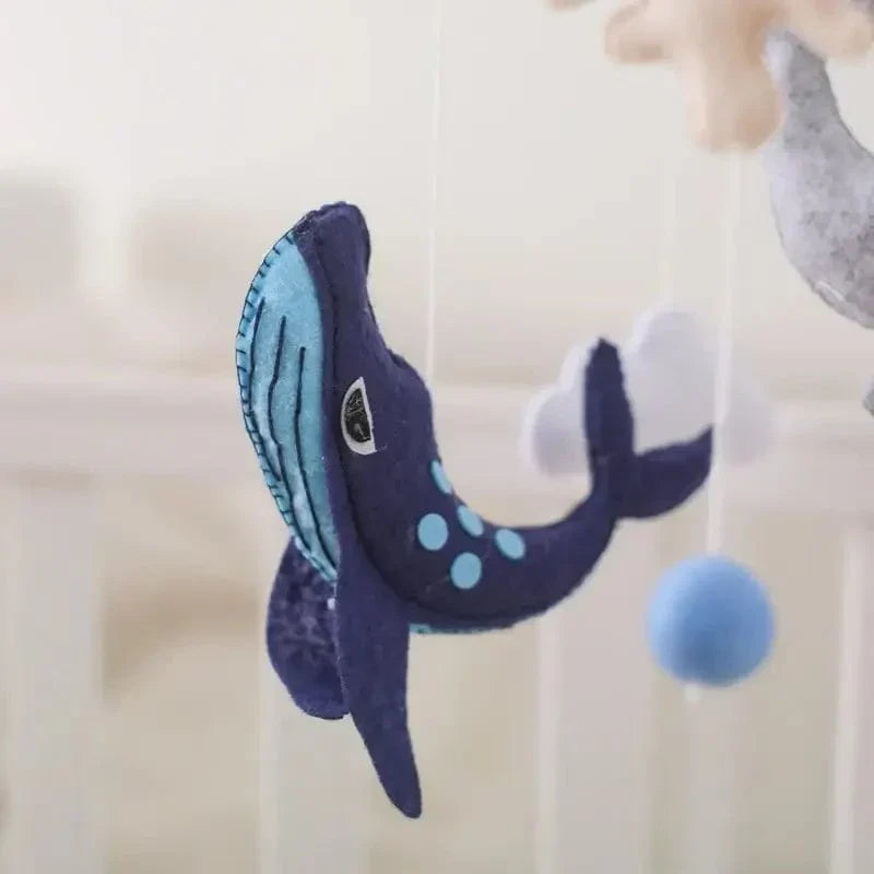 Artistic shot of a Baby Sensory Wooden Mobile, emphasizing the interplay of wood and felt textures, natural materials