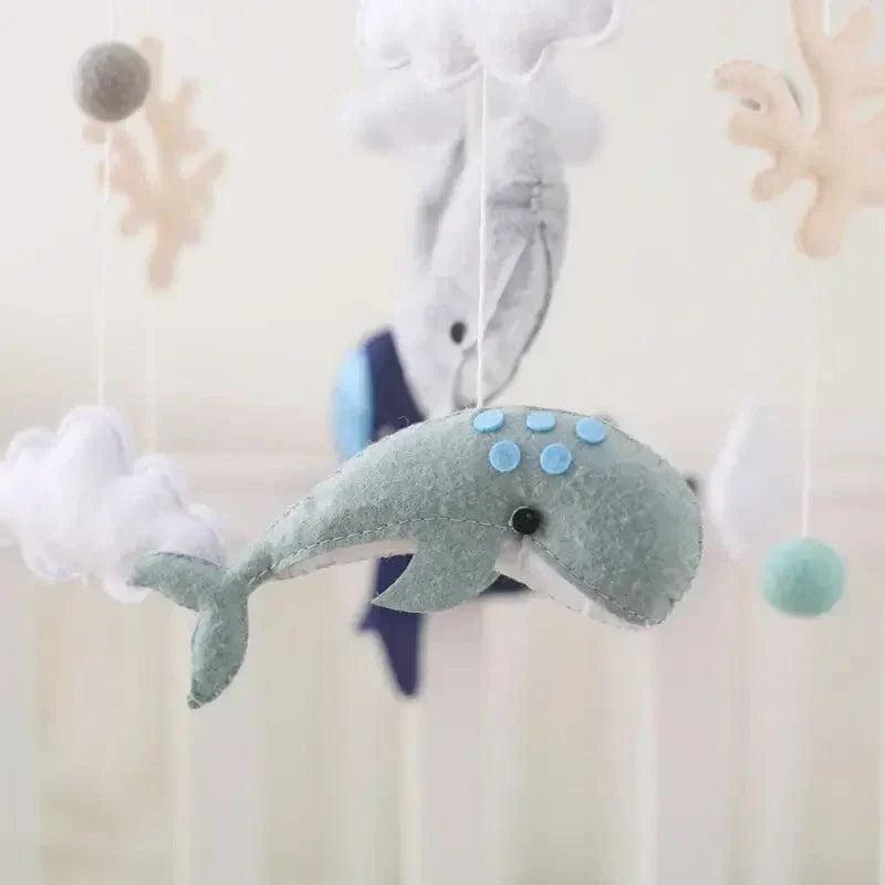 Versatile Baby Sensory Wooden Mobile, suitable for various nursery themes with its neutral wooden and felt design