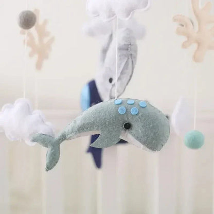 Versatile Baby Sensory Wooden Mobile, suitable for various nursery themes with its neutral wooden and felt design
