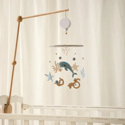 Baby Sensory Wooden Mobile with minimalist design, white felt clouds and natural wood, perfect for modern nurseries