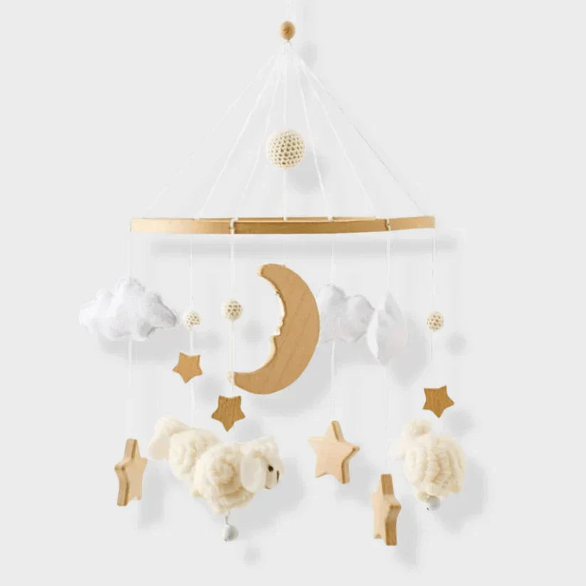 Detailed view of a Baby Sensory Wooden Mobile showing varying wood tones and soft felt textures, sensory play