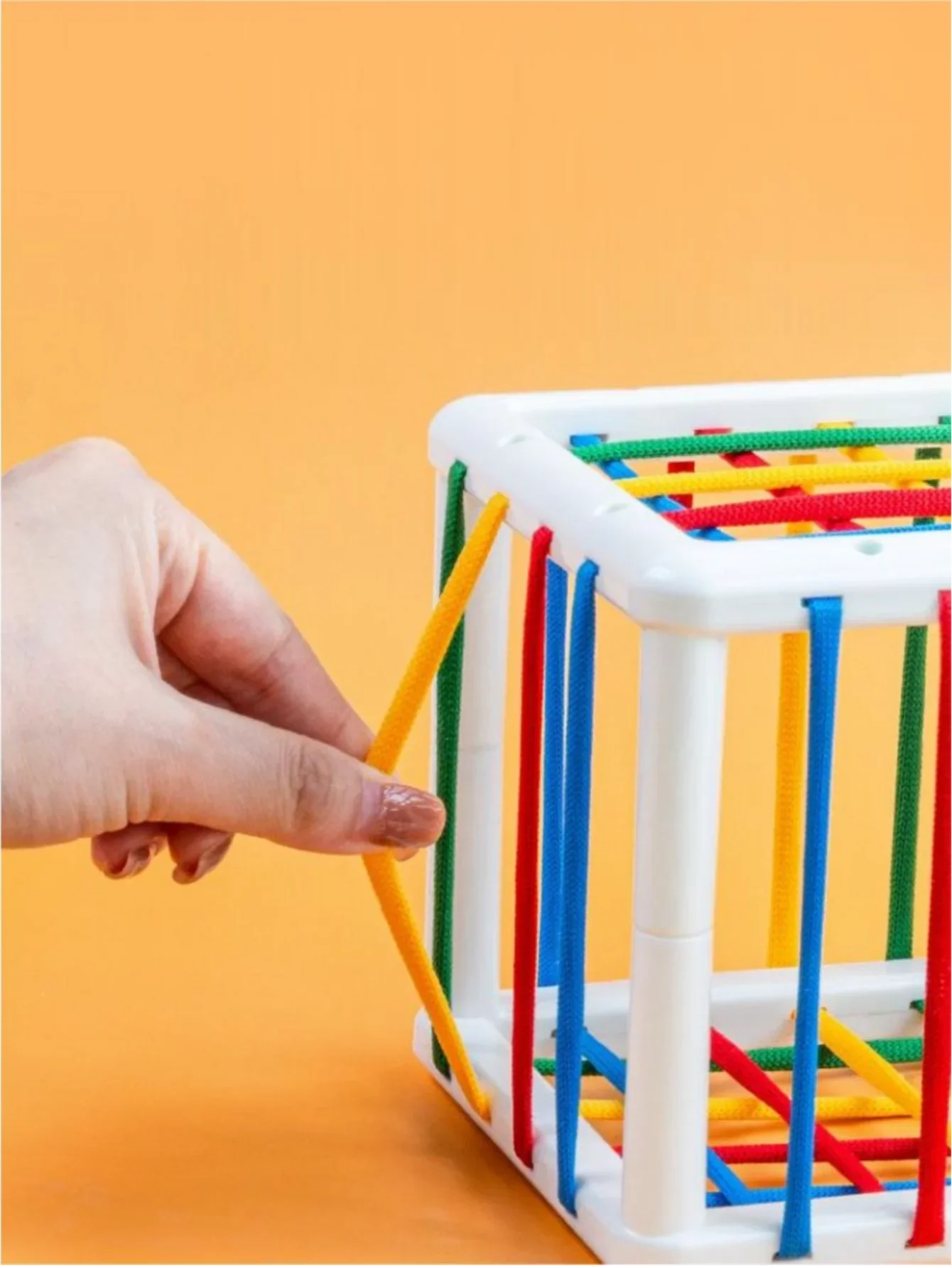 Baby Shape Sorter Cube on a playmat, a classic infant toy for early education