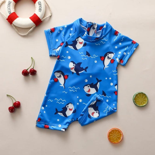 Baby Shark blue swimsuit for infants. Cute & comfy toddler bathing suit with fun shark design, perfect for summer pool days.