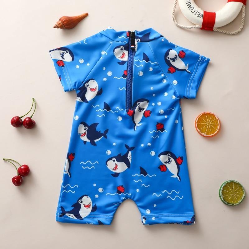 Comfy Baby Shark spandex swimsuit for infants. Easy-change blue toddler bathing suit, ideal for active kids at the beach.