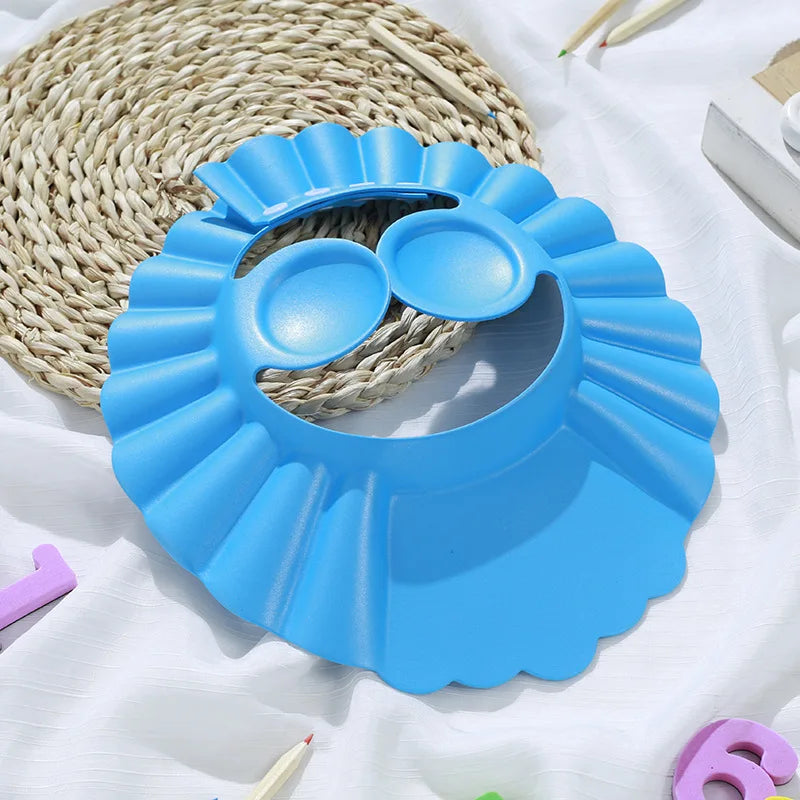 Kids' bath time essential: ear protection shower cap. Cute animal motif, gentle on baby's skin.