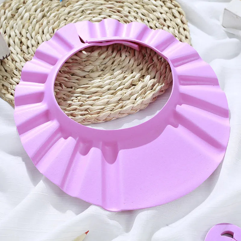 Toddler bathing cap with ear protection. Designed for ultimate comfort and tear-free shampooing.