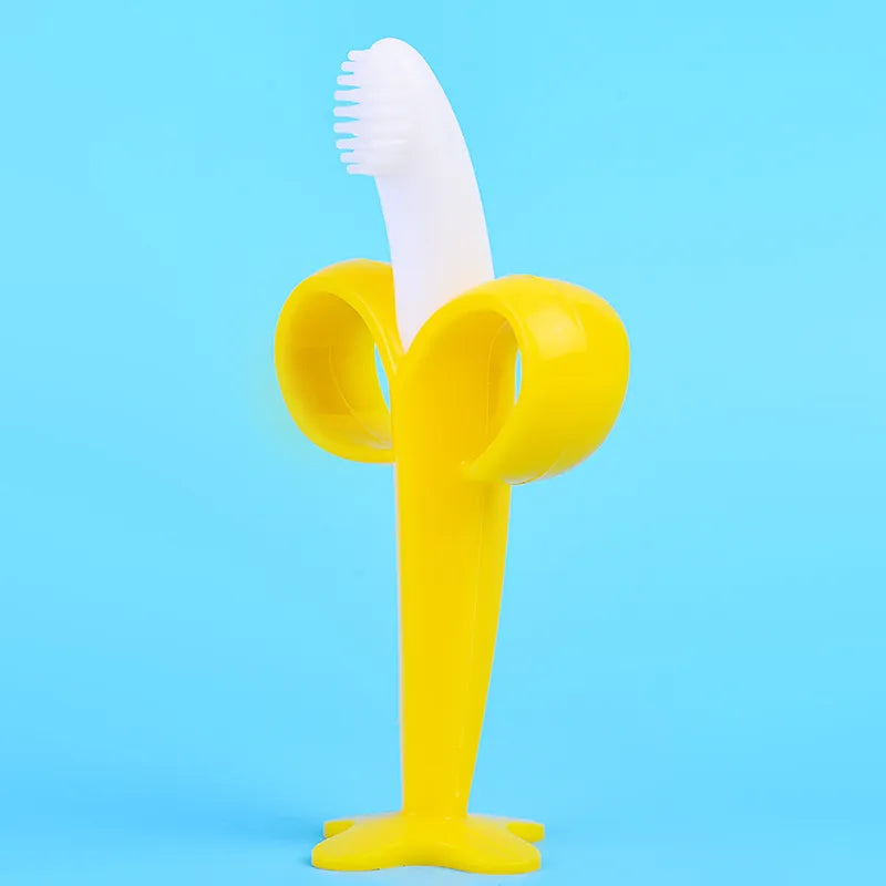 Toddler banana silicone toothbrush teether, designed for easy grip & early dental habits.