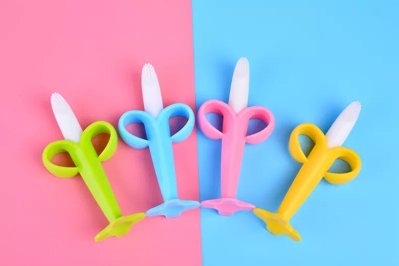 Chewable banana silicone teether & toothbrush for toddlers. Promotes good oral hygiene habits.