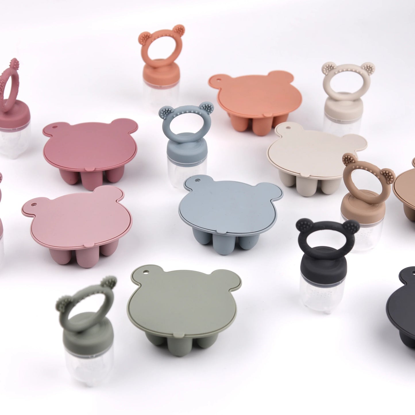 Close-up of pink silicone bear freezer tray for baby food & snacks, soft & safe