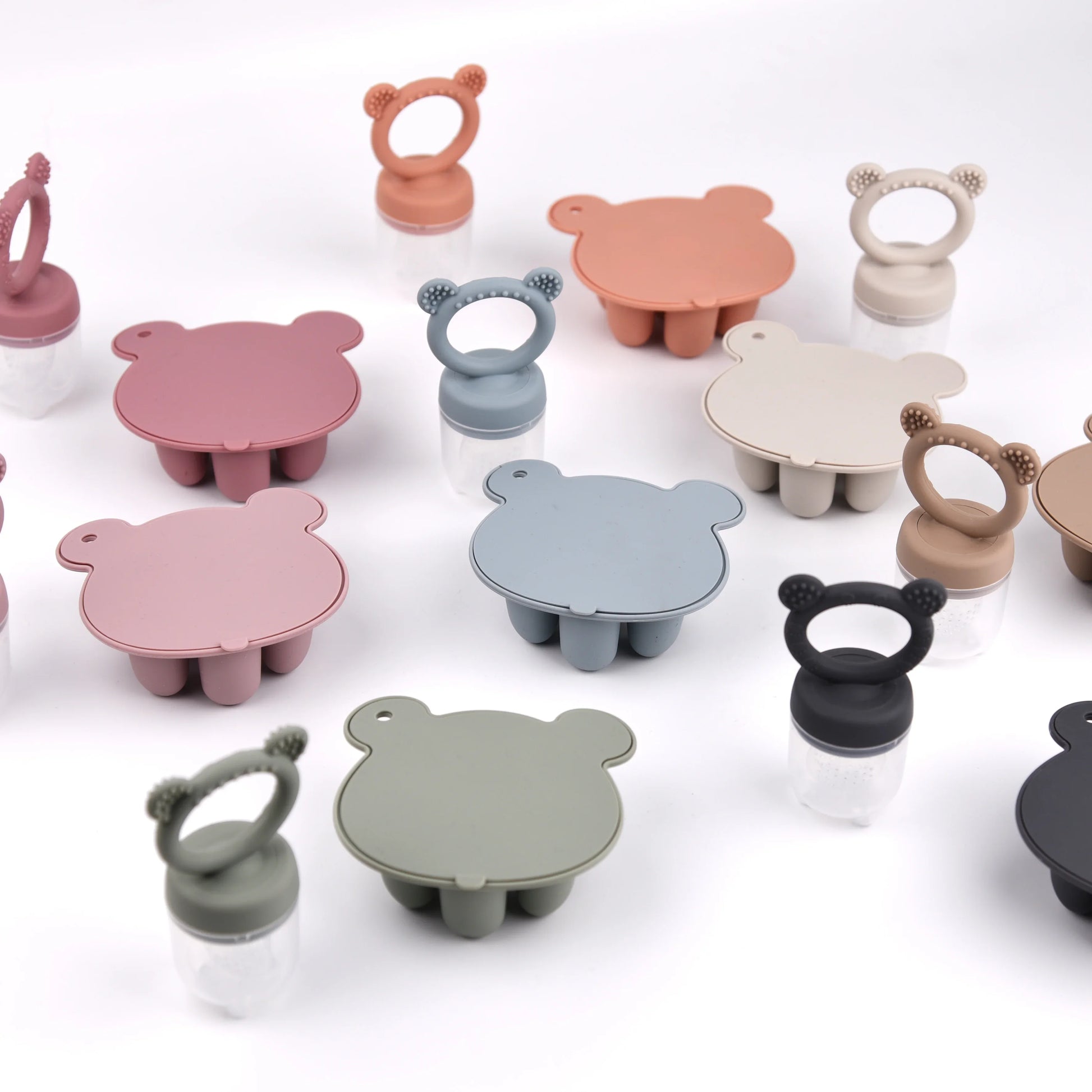 Close-up of pink silicone bear freezer tray for baby food & snacks, soft & safe