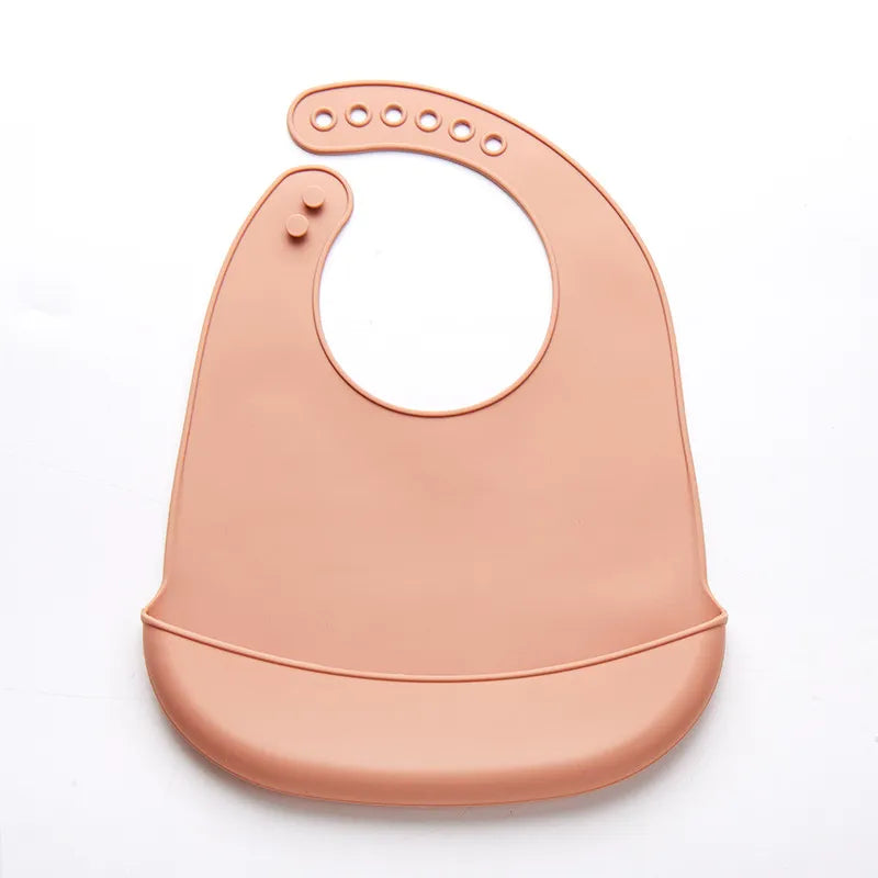 Modern design silicone baby bib, adjustable, available in multiple solid colors.