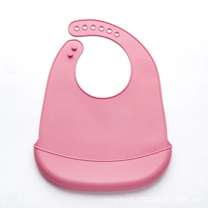 Safe silicone baby bib, BPA-free, adjustable for various ages, mess-free.