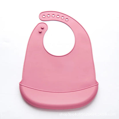 Safe silicone baby bib, BPA-free, adjustable for various ages, mess-free.