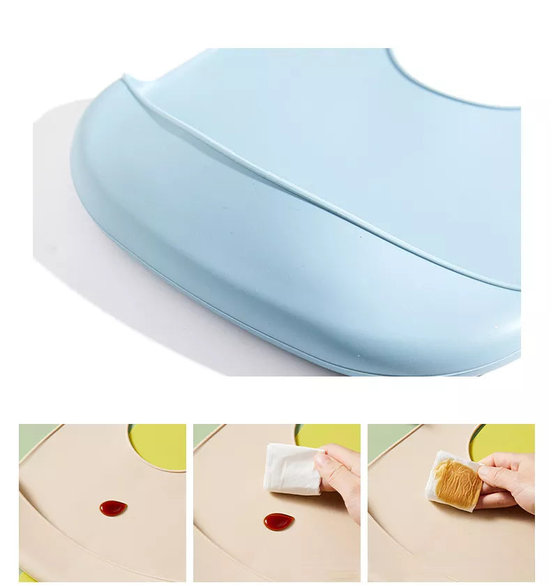 Stylish baby silicone bib, adjustable, ergonomic design for comfortable feeding.