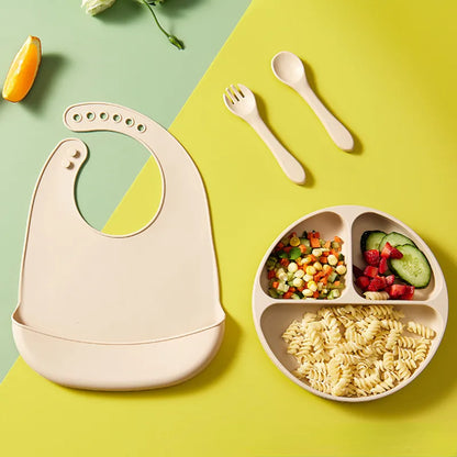 Infant feeding bib, silicone, adjustable snaps, compact for travel, waterproof.