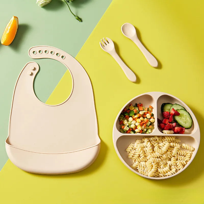Soft silicone baby bib with adjustable neck fasteners, ideal for feeding time.
