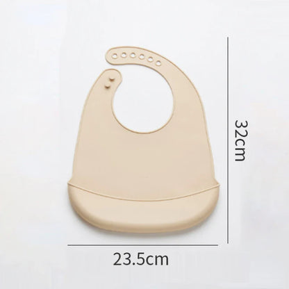 Durable baby silicone bib in vibrant blue, adjustable for comfortable wear.