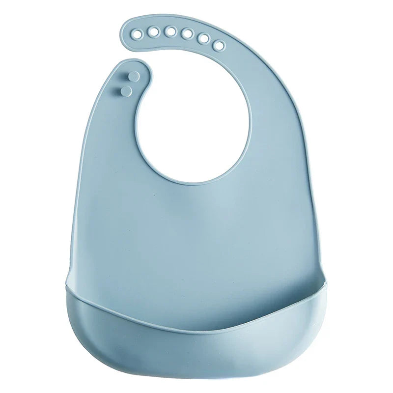 Adjustable snap silicone bib for babies and toddlers, ensuring mess-free mealtimes.
