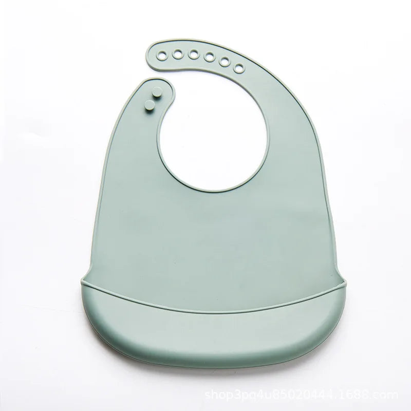Lightweight baby silicone bib, adjustable snaps for a customized fit, easy to clean.