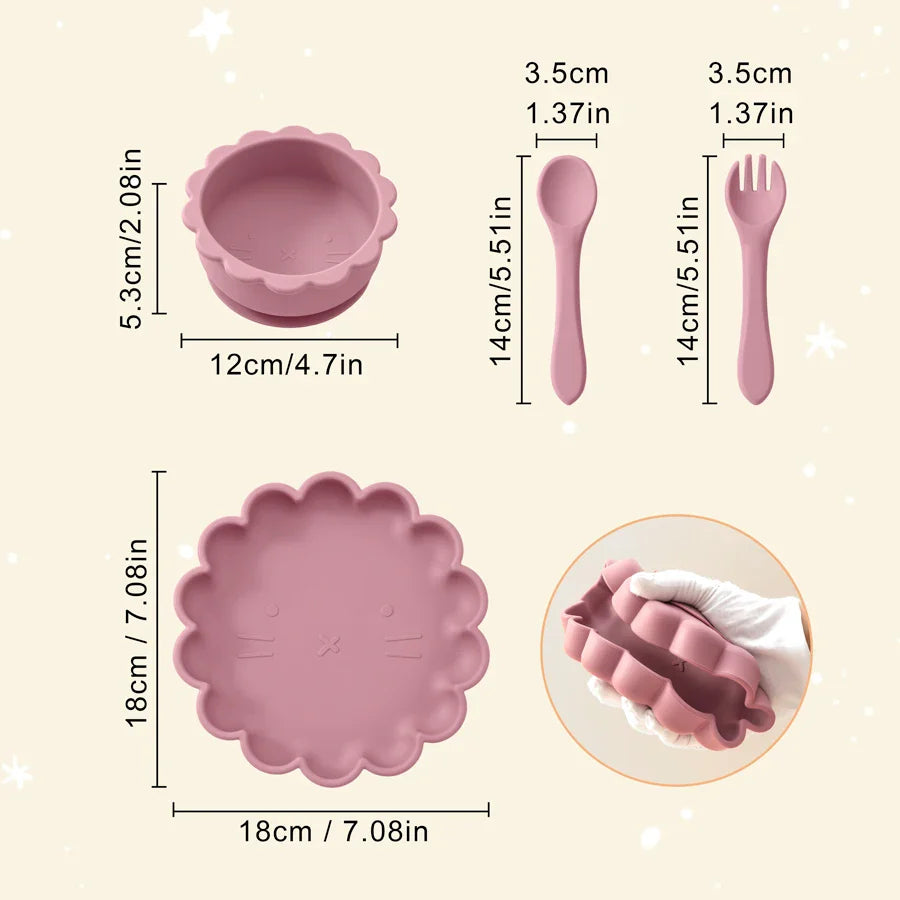 Detail view of the ergonomic silicone baby spoon and fork from the lion set