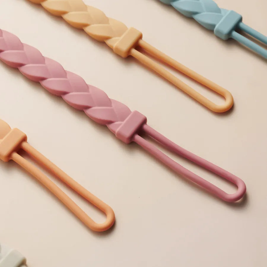 Baby gift idea: colorful silicone pacifier & teether clip for comfort and play.