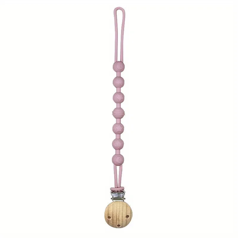 Pink silicone pacifier clip with a round teether, a cute and functional infant accessory.