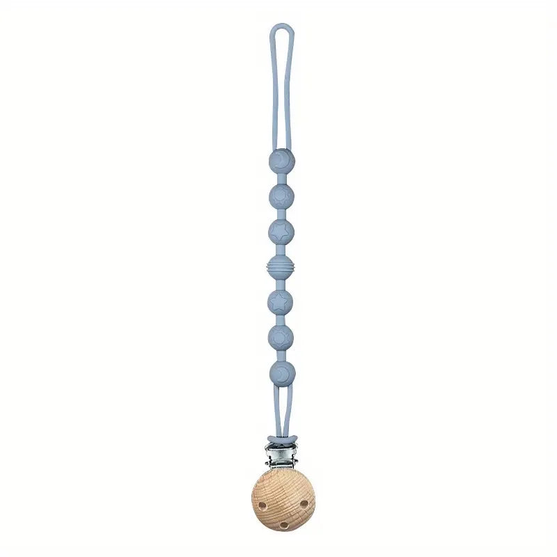 Green silicone pacifier clip, featuring a textured teether to massage baby's gums.
