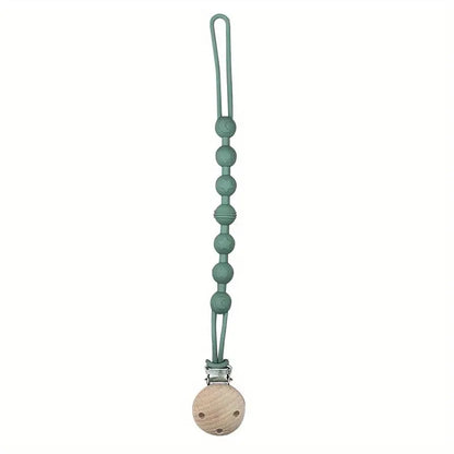 Pacifier and teether set: silicone clip designed for easy attachment and soothing.