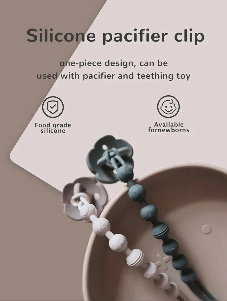 Baby feeding accessory: resilient silicone pacifier clip with an effective teething solution.