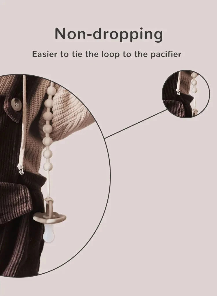 Flexible silicone pacifier clip with a star teether, providing comfort and preventing loss.