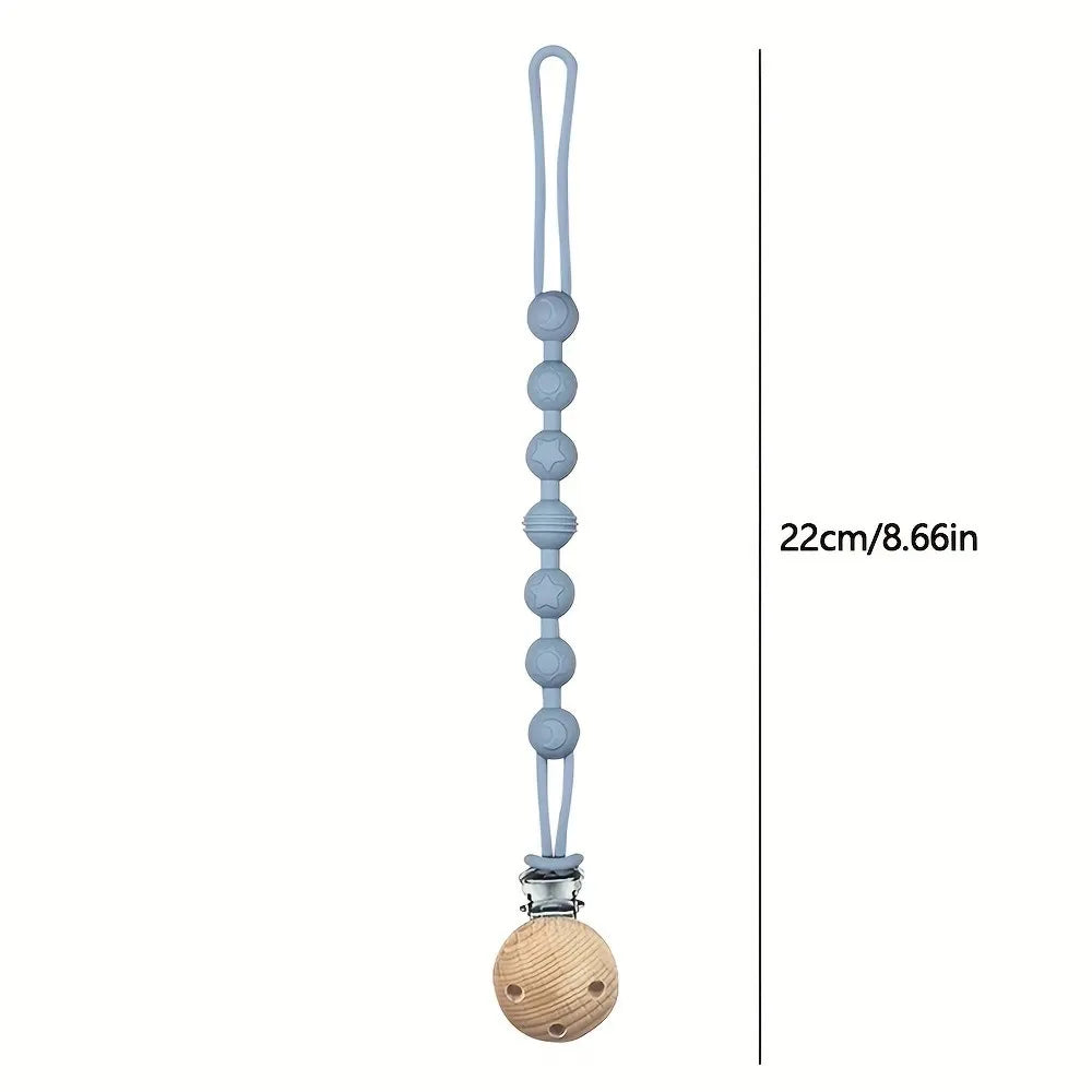 Stylish baby pacifier clip with silicone beads and an attached teether, great for baby gifts.