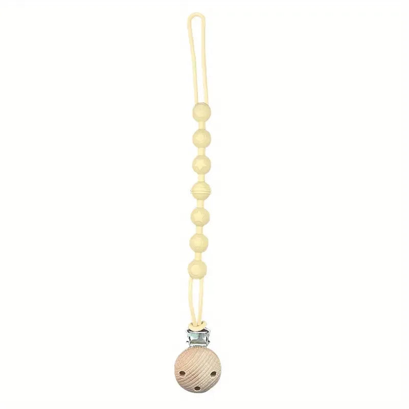 Secure baby pacifier clip with a soft silicone teether for comfortable teething relief.