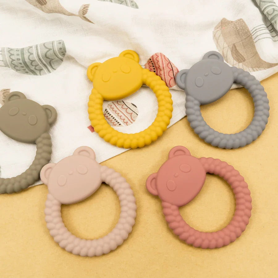 BPA-free silicone panda teether, a safe and soothing infant teething toy for oral care.