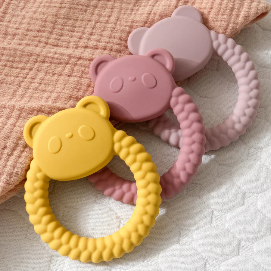 Cute panda-shaped silicone teether, perfect for soothing baby's sore gums and oral development.